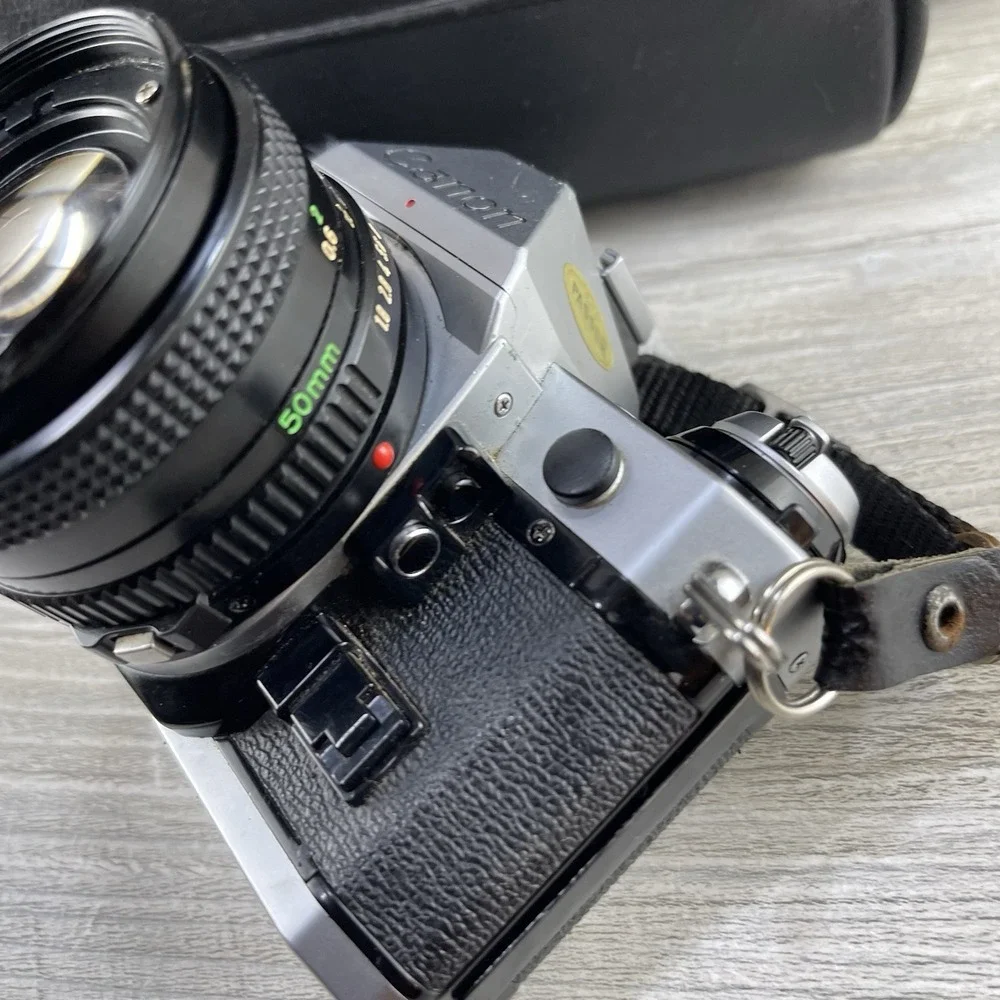 Canon AE-1 35mm SLR Film Camera w/ 50mm f/1.4 FD Lens